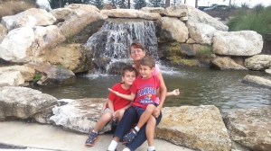 mom and boys bass pro waterfall